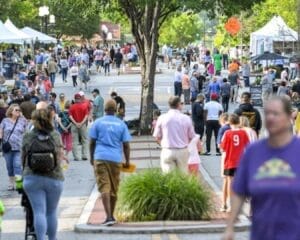 Crowded street in downtown Anderson during previous soirée