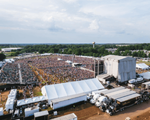 Aerial shot of Civic Center in Anderson, SC during Rock the Country filled with thousands of people.